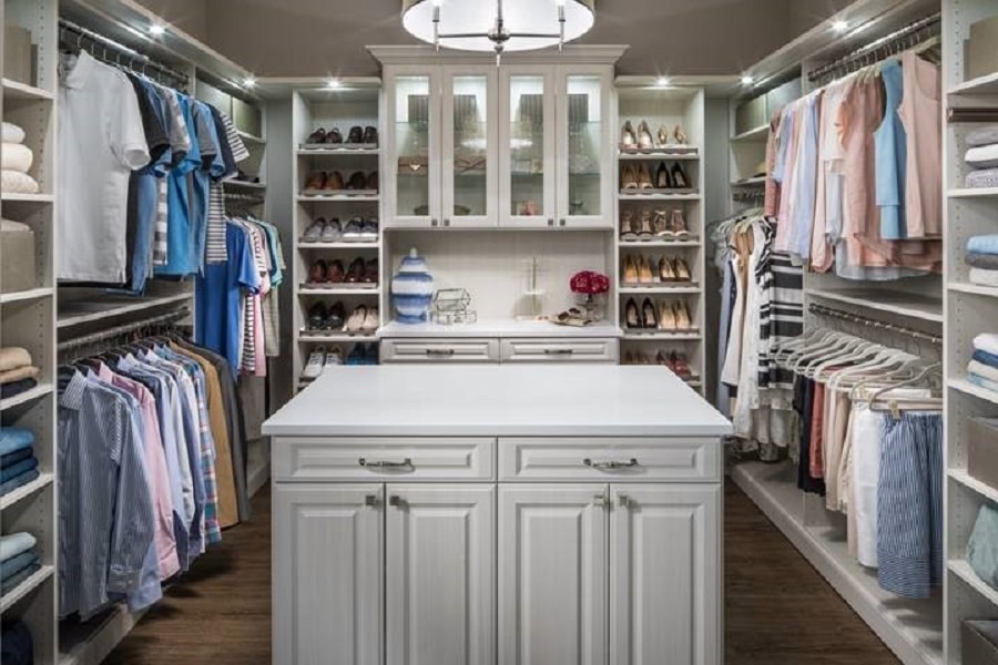 Tip 7 master walk in closet feature wall with glass doors credit www.inspiredclosetschicago.com | New Albany, OH | Innovate Home Org #CustomCloset #ClosetRemodel #Closet