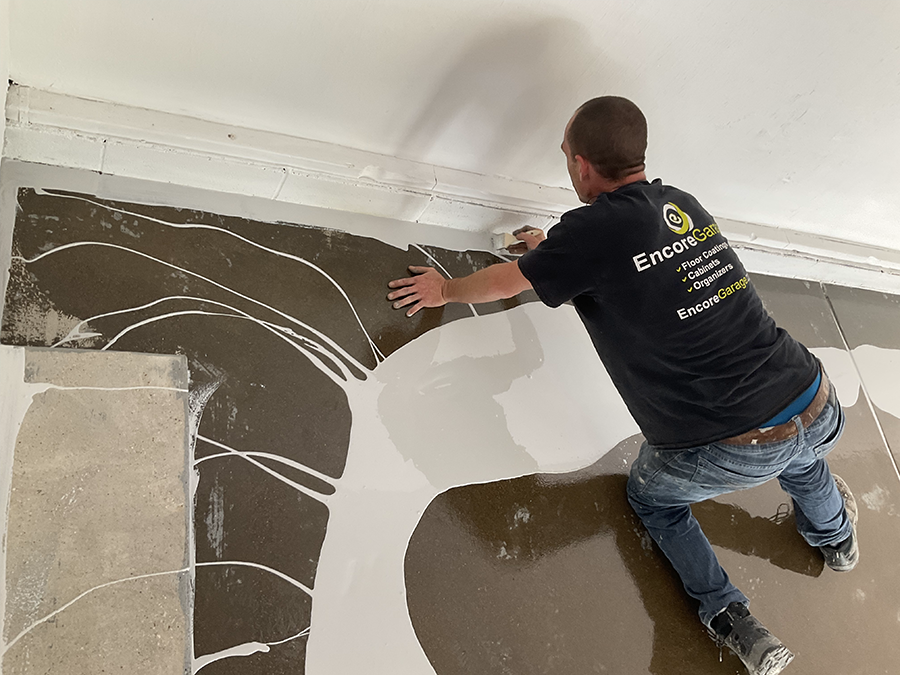 Step 3 base coat painted on floor Coating Garage Floors | Garage Organization