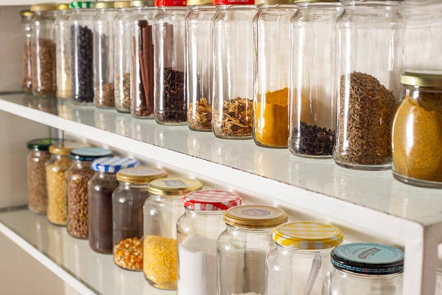 Strategy 5 clear glass containers in organized Columbus Ohio pantry | Innovate Home Org | Upper Arlington Ohio | Pantry Room Storage | Storage System